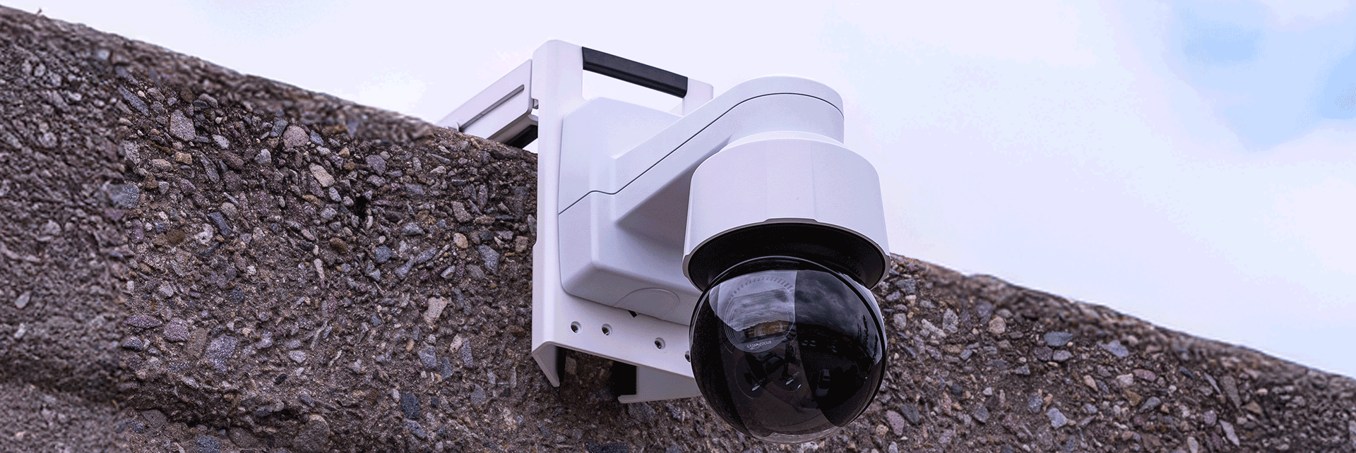 Clamp-vs.-Core-vs.-Sled-Side-by-Side-Costs-for-Mounting-Axis-PTZ-Cameras-on-Tilt-Up-Building